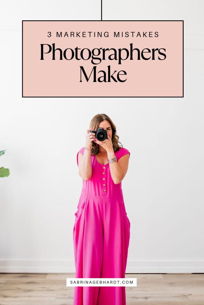 female photographer and business coach holding camera in fort worth texas