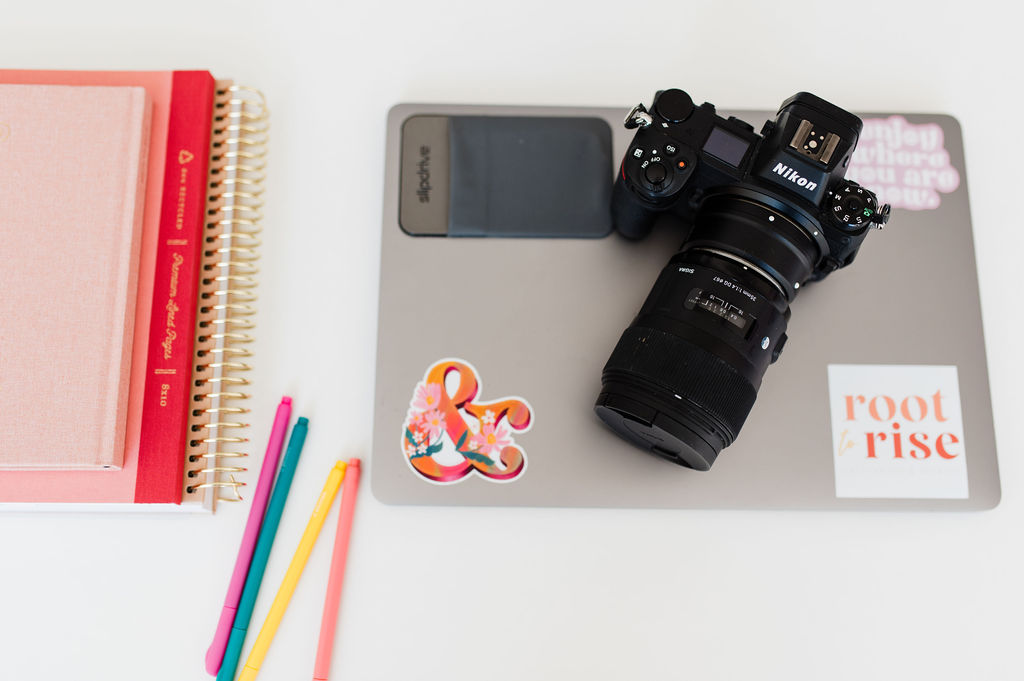 camera on a desk with markers