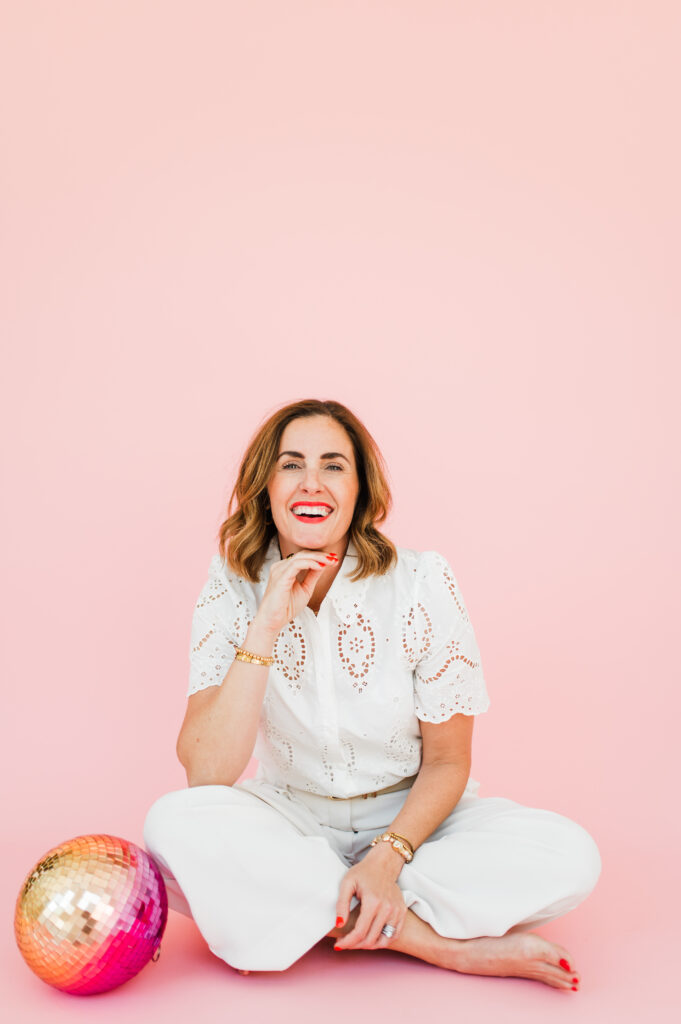 Joyful branding photo of a photographer celebrating time freedom—key theme in her Imagen AI review focused on efficient editing tools.
