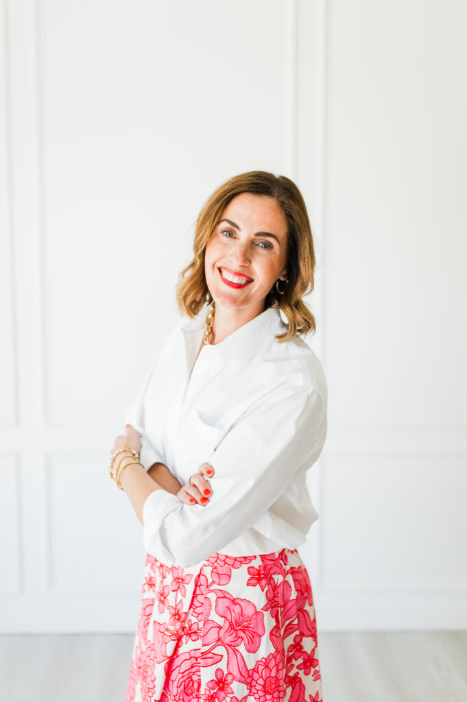 Branding photo of a photographer and mentor offering photography business tips to help creatives build sustainable businesses.