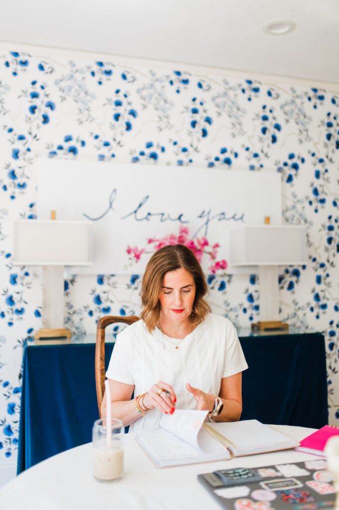Behind-the-scenes look at a creative entrepreneur planning content and sharing photography business tips for balance and growth.