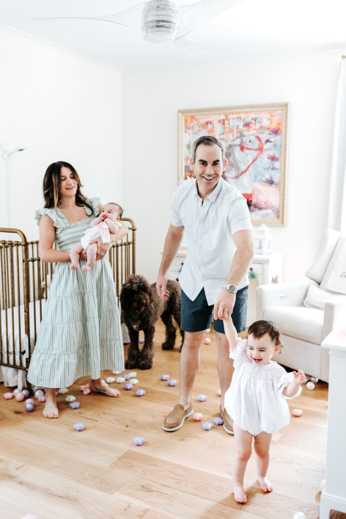 Preparing for a Family Photo Session: How to Help Clients Feel Confident, Calm, and Truly Ready 4 Young family moving through their home during an in home lifestyle session, showing genuine connection without rigid posing.
