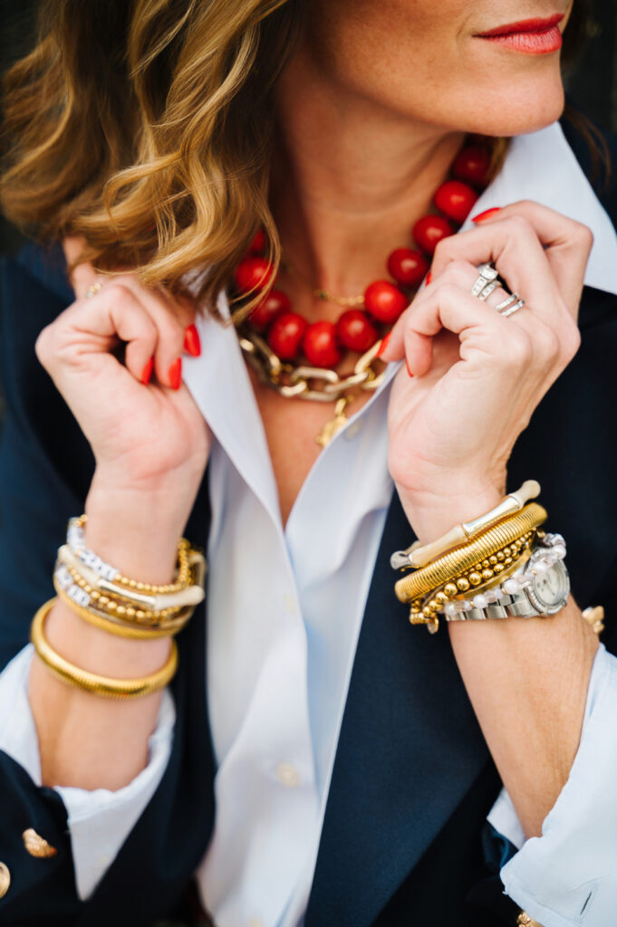 Lessons in Photography: What Challenging Sessions Can Teach You 4 Close-up of bold red accessories, stacked bracelets, and professional styling that highlight lessons in photography about details and storytelling.