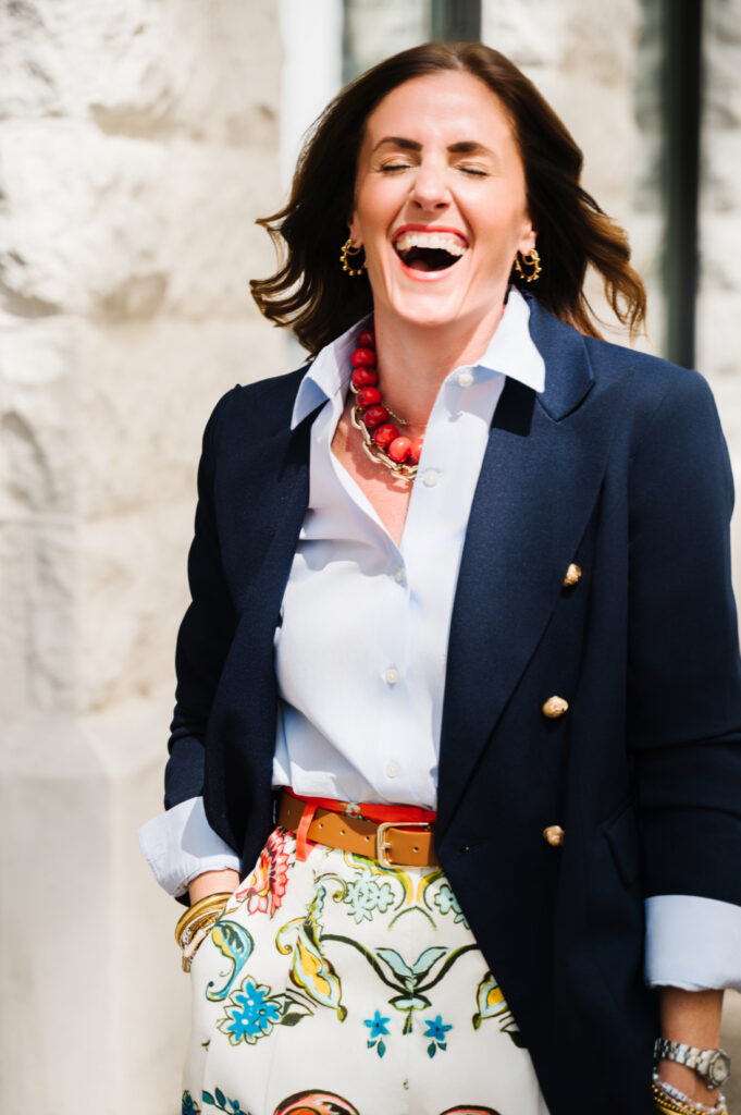 Sabrina Gebhardt laughing during a branding session, representing a joyful and sustainable approach to marketing without social media for photographers.